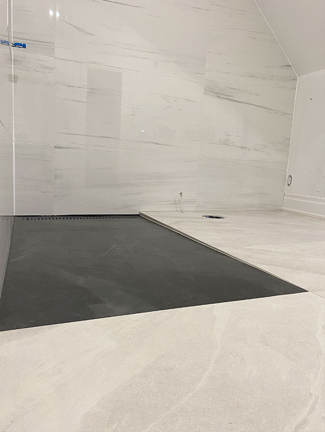Black and white curbless shower oakville
