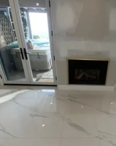 Oakville heated floor, after photo: heated floor tile before and after by Burlington Tile