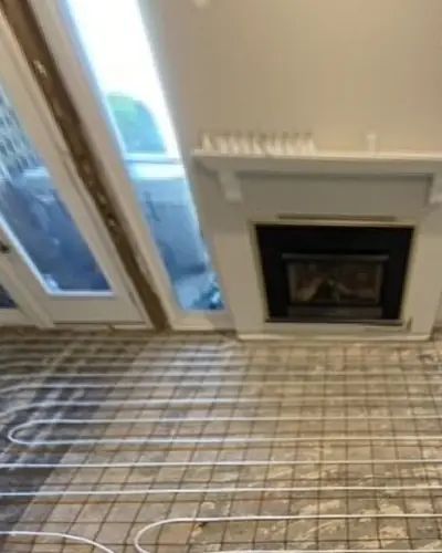 Oakville heated floor, before photo: heated floor tile before and after by Burlington Tile