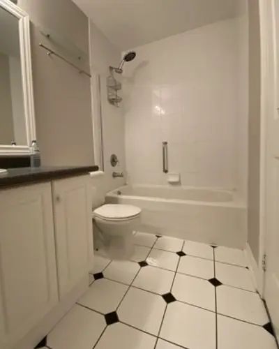 Waters Edge shower, before photo: before during and after bathroom renovation by Burlington Tile